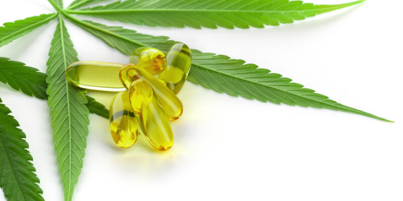 Cannabis essential oil Capsules with cannabis leaves