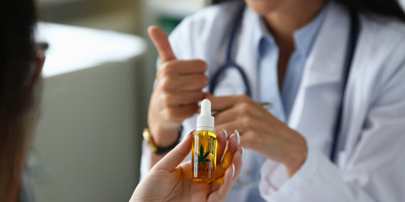 Doctor in office prescribing marijuana extract