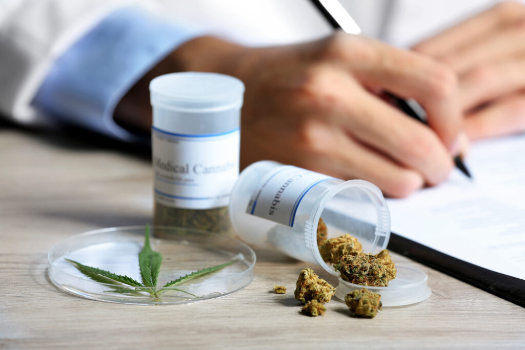 Doctor writing a prescription of medical cannabis